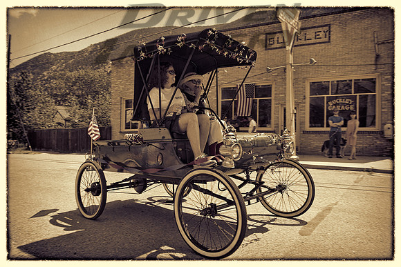 Early 1900s Oldsmobile Curved Dash - Elliot's Upholstery - 1 - Antique Black & White