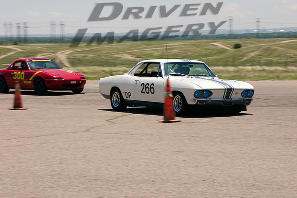 Eric Schakel #266 Chevrolet Yenko Stinger & Nick Aretakis #300 1991 Mazda Miata - Worker Rides