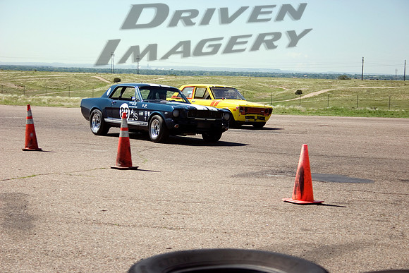 Walt Hane #89 1965 Ford Mustang & Frank Scholer #17 1971 Datsun B-510